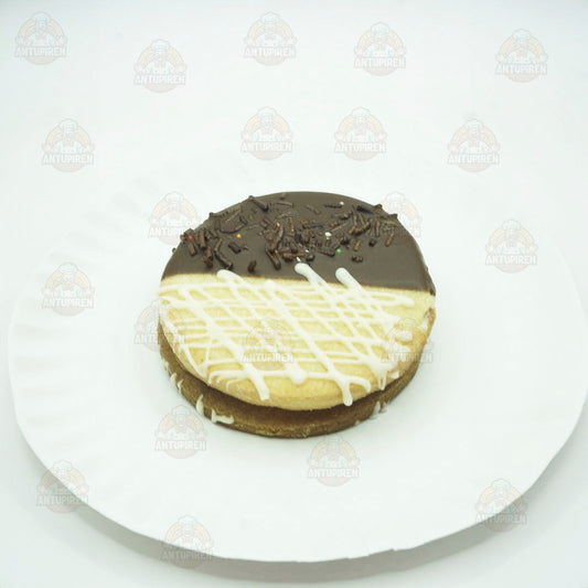 Mendocino relleno de Manjar y cubierto con mix de Chocolate / Pack de 10 unidades